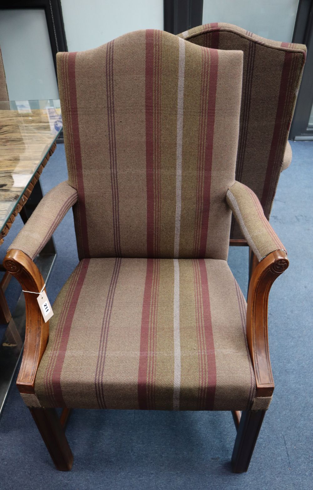 A set of ten George III style mahogany dining chairs, recently re-upholstered in striped fabric (two with arms)